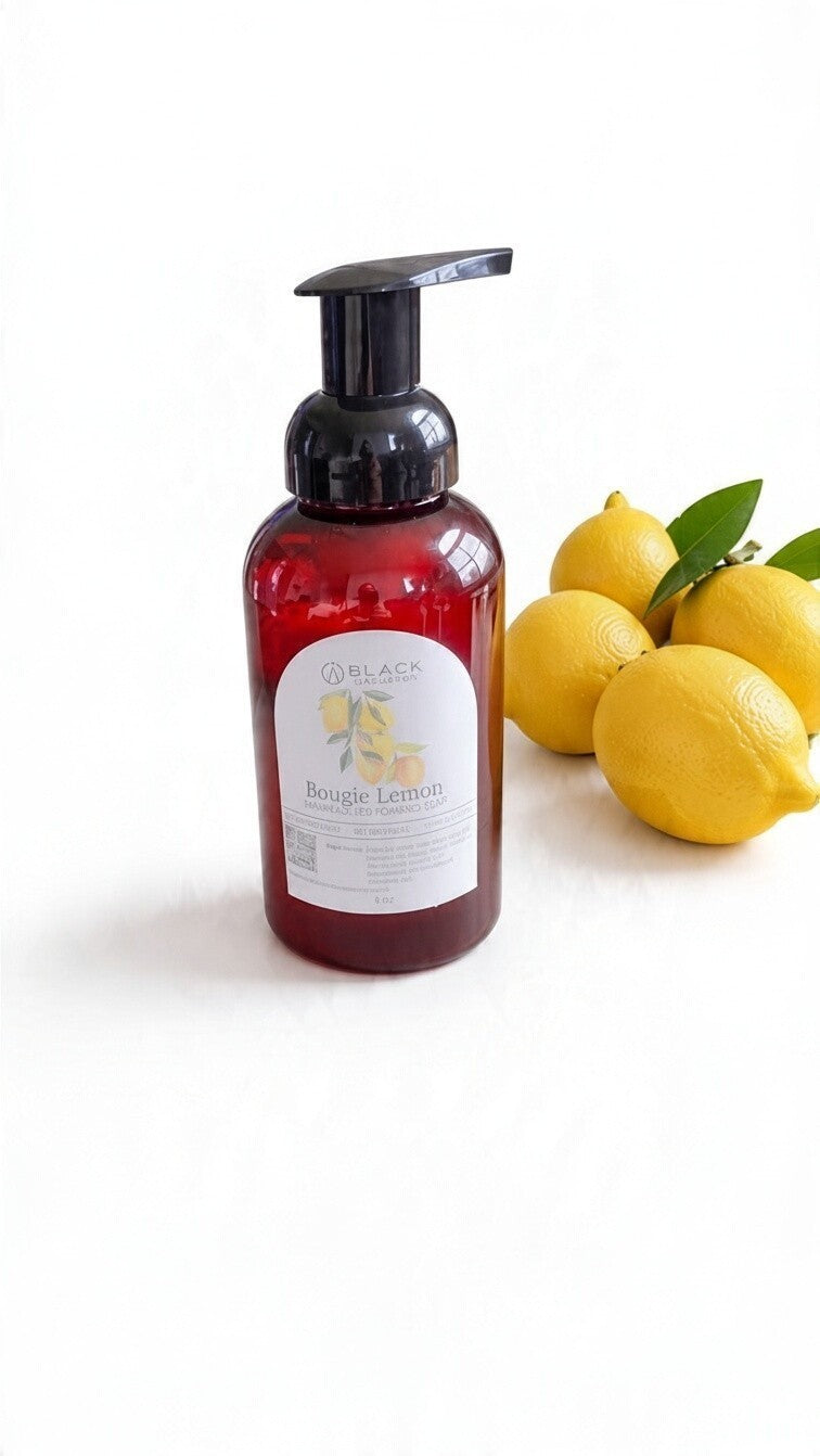 Bougie Lemon foaming hand soap in an amber bottle with a black pump against a textured cream background.