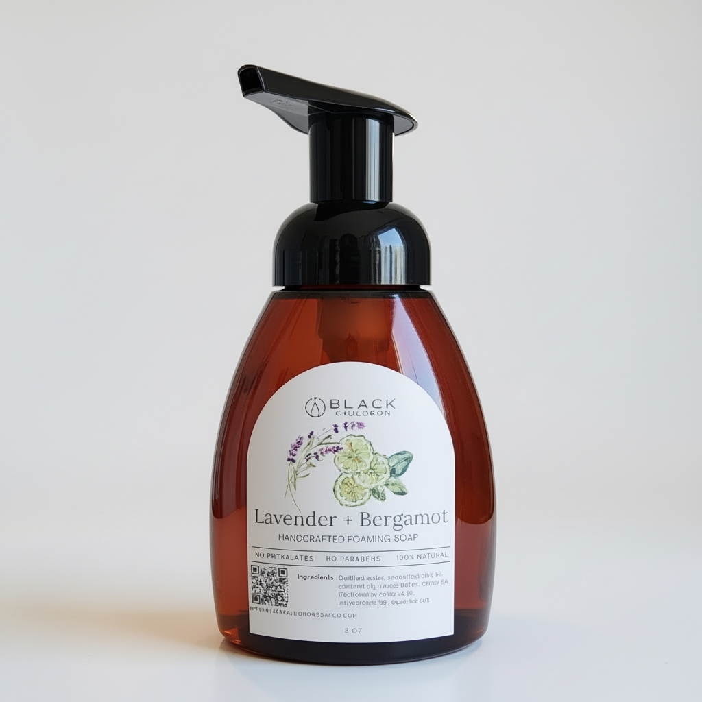 Lavender bergamot scented foaming hand soap in an amber bottle with black pump.