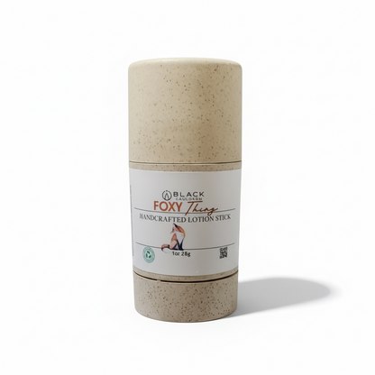 Handcrafted lotion stick with a white label on a white background