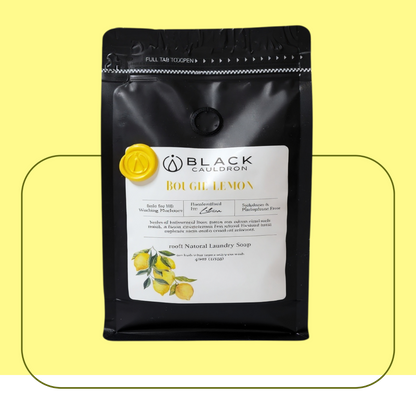 Bougie lemon laundry soap picture.  Black laundry soap packaging with a label and lemon illustrations on a yellow background.